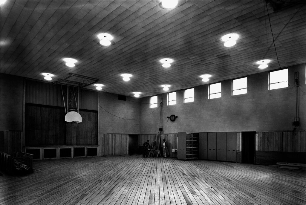 oak ridge, tennessee, 1940s, black and white, gym, gymnasium, floor, lights, lighting, building, interior, architecture, men, working, gray work, gray gym, gray light, gray building, gray interior, gray lights, gym, gym, gym, gym, gym, gymnasium, gymnasium, gymnasium, gymnasium